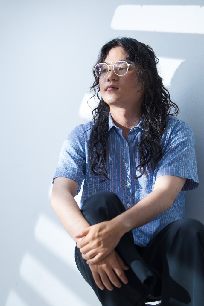 Yeonsuk Jung seated in window light